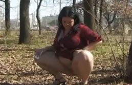 Chubby brunette with a public pee fetish